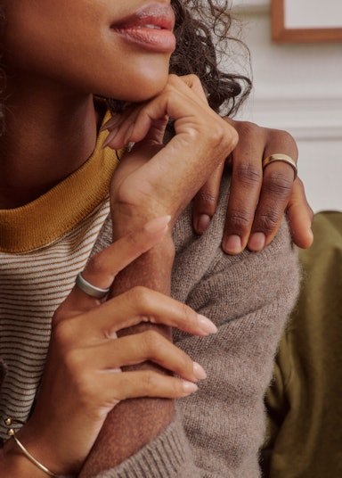 Two people embracing while wearing Auro Ring 5